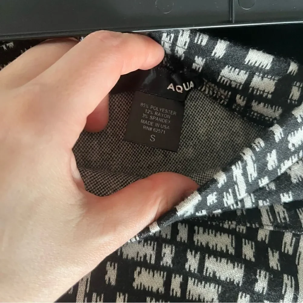 Aqua(Bloomingdales) black and white patterned circle skirt.